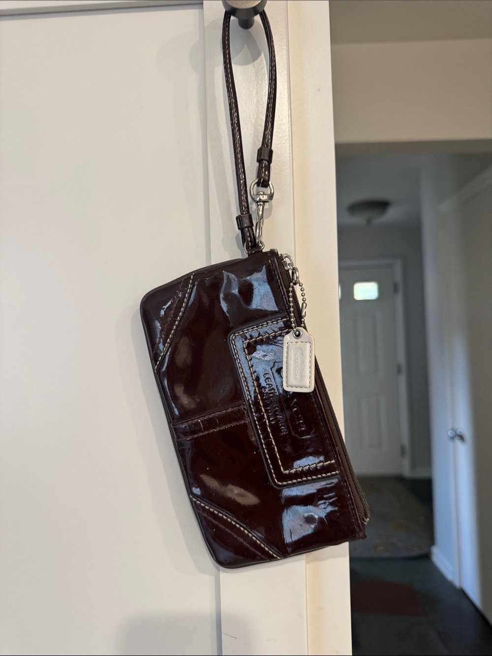 Coach Glossy Patent Leather Wristlet in Dark Brown